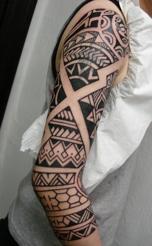 In Hand Polynesian Tattoo Picture.
