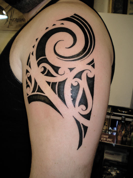 Polynesian style tribal chest tattoo. Meaning of Polynesian Tattoos.