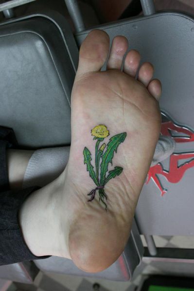 Tattoos gone wrong: when you've run out of skin, use your foot.